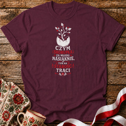 Czym Skorupka Nasiąknie Unisex T-Shirt